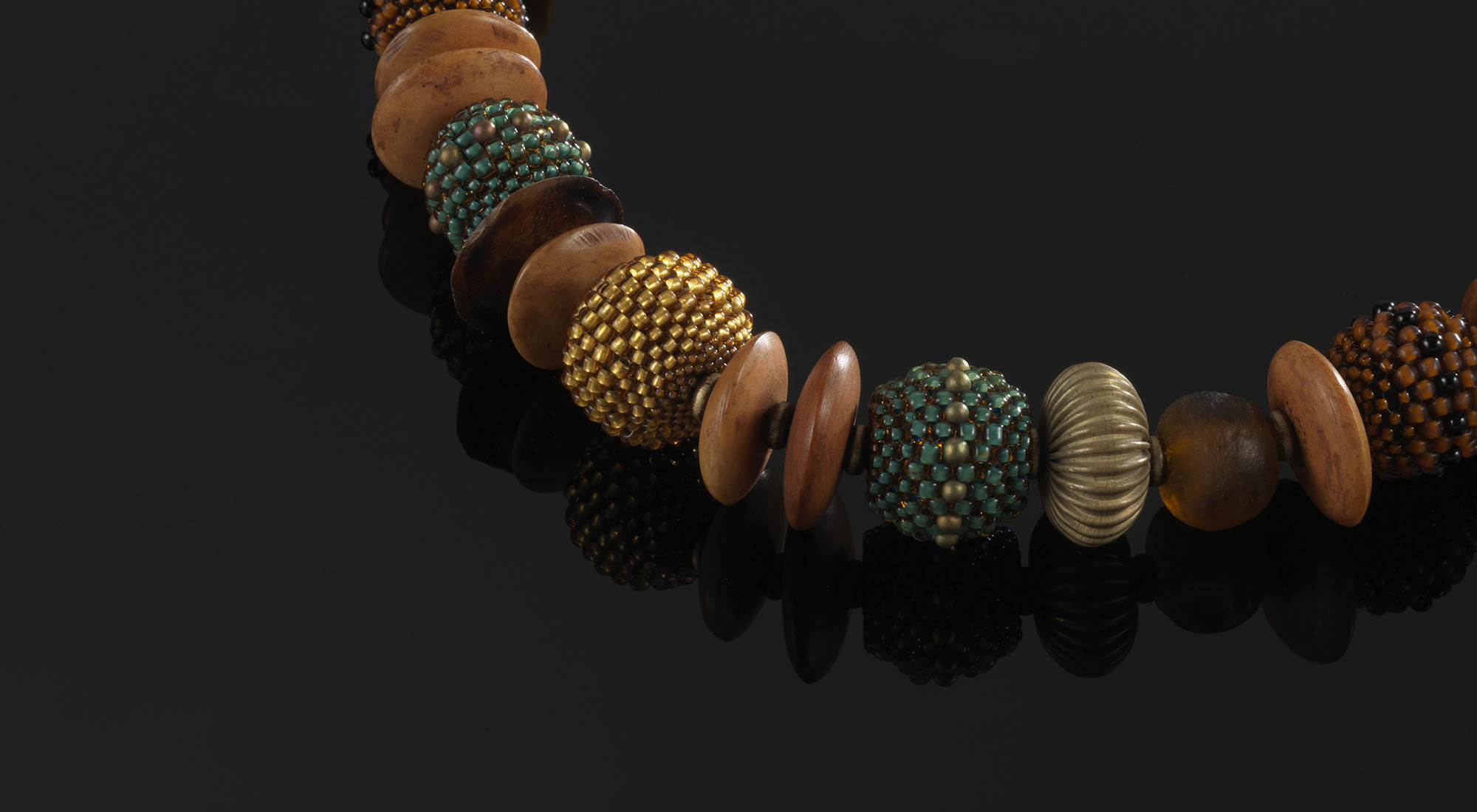 Savannah—Hand-stitched 20mm seeded beads and vintage African trade beads.