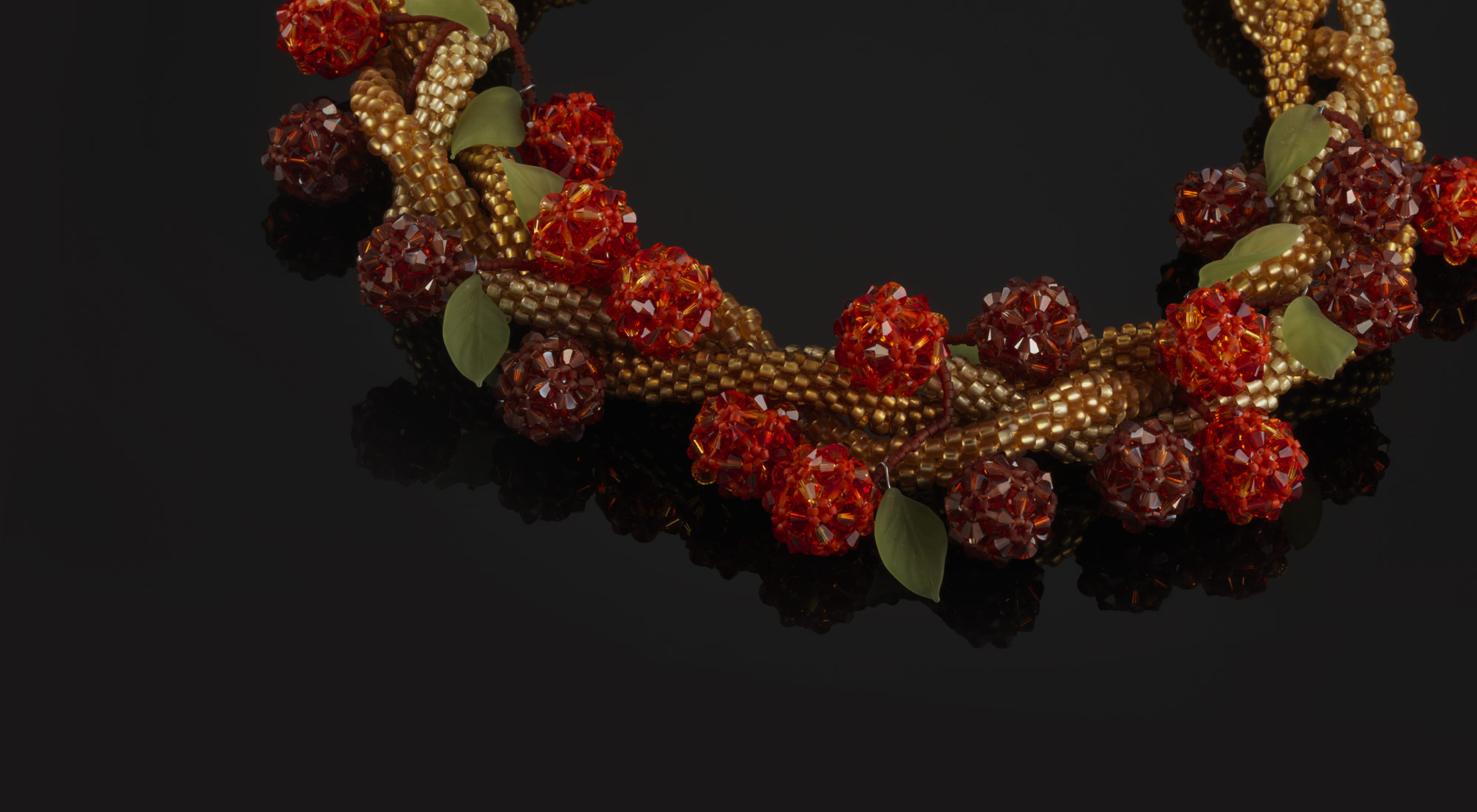 Bittersweet Berries—Three strands of Japanese beaded kumihimo necklace with Swarovski crystal berries . 